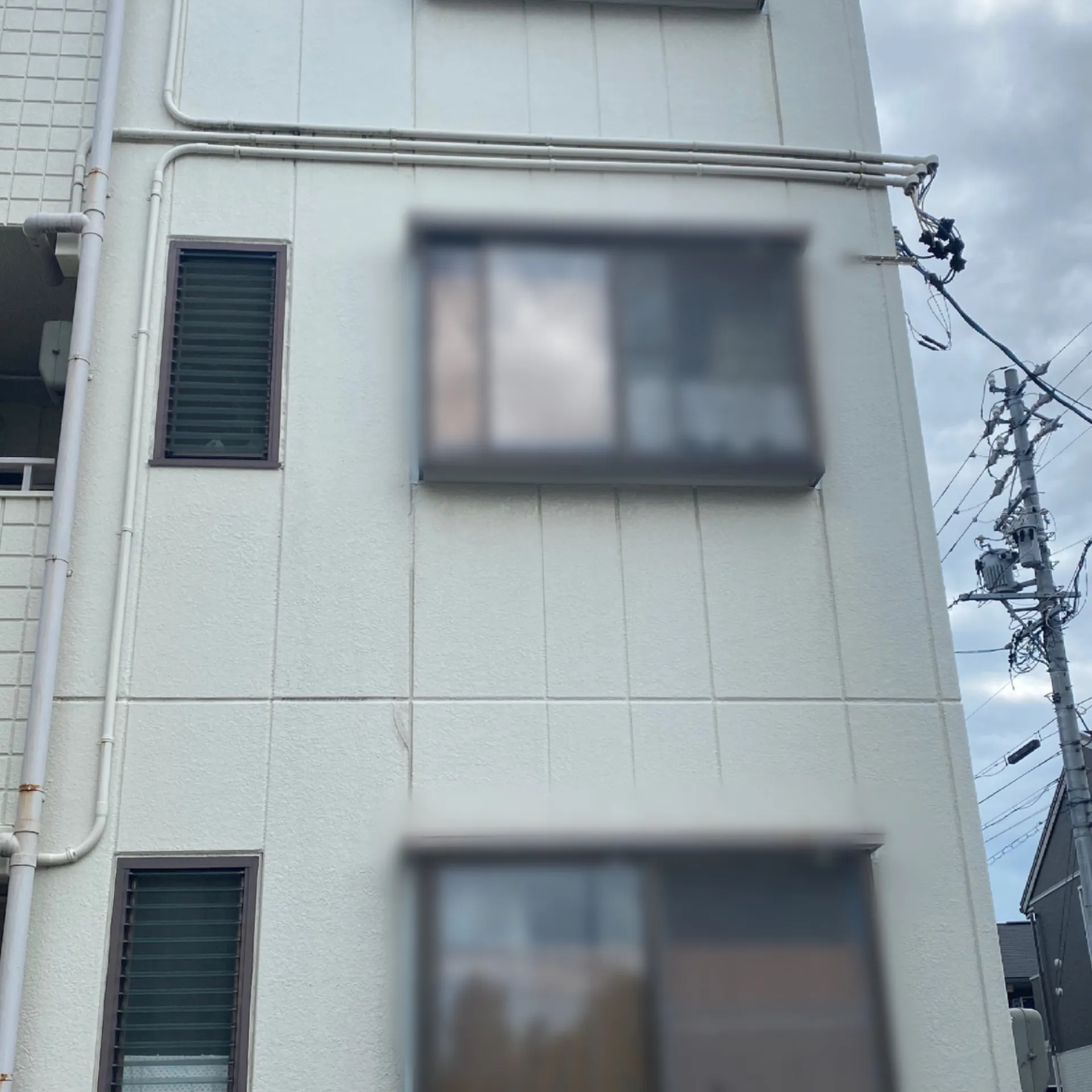  施工前 / 北西ALC外壁全体　全体的な色褪せ